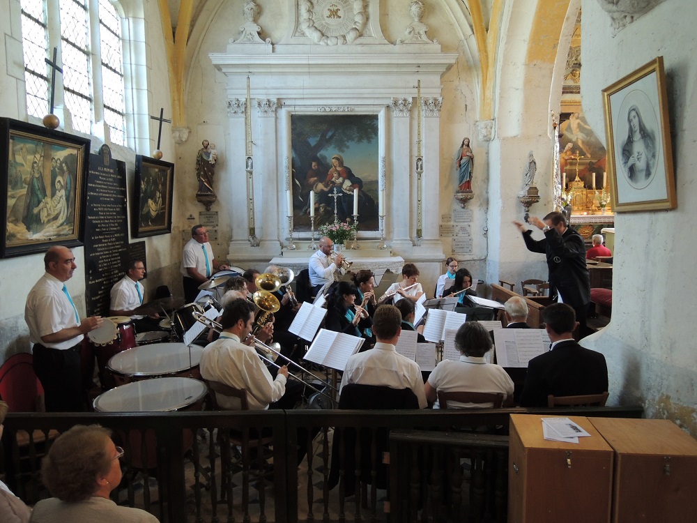 10 photos de l'harmonie défilant en diaporama